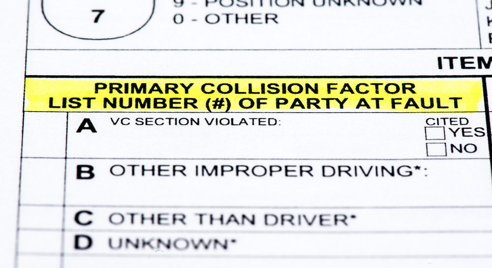A close up of a police report listing fault